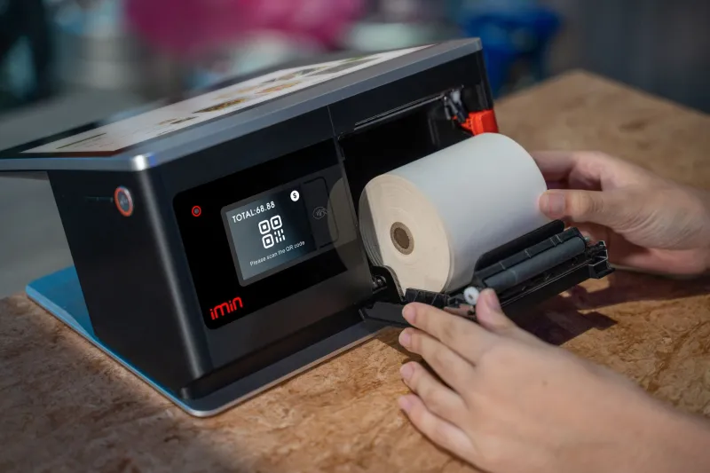 Going Green Saves Green: The Real Cost of Cheap Receipt Paper on Your Business and the Planet